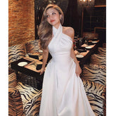 Halter Neck Pleated Midi Dress in Silk with Crossover Bodice and Pearl Detail